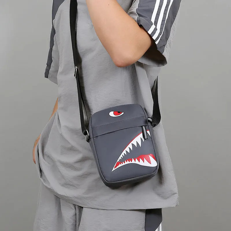 Men's small Oxford cloth crossbody bag with animal print pattern in black colour