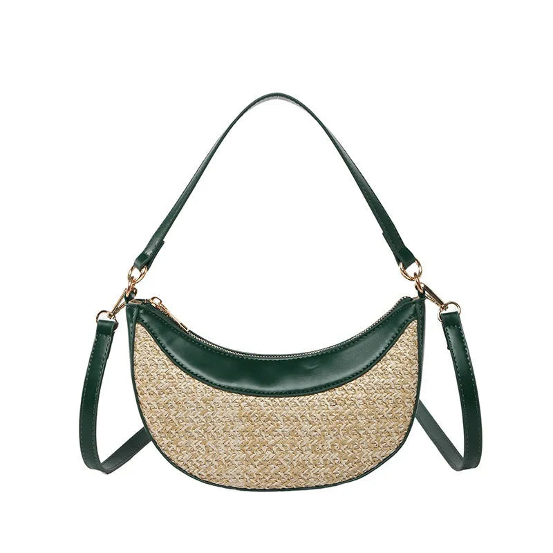 Women's straw crossbody dumpling bag in black colour with contrast stitching and organised internal compartments