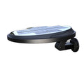 Black outdoor solar wall light with LED panel on a brick wall, IP65 waterproof garden lighting