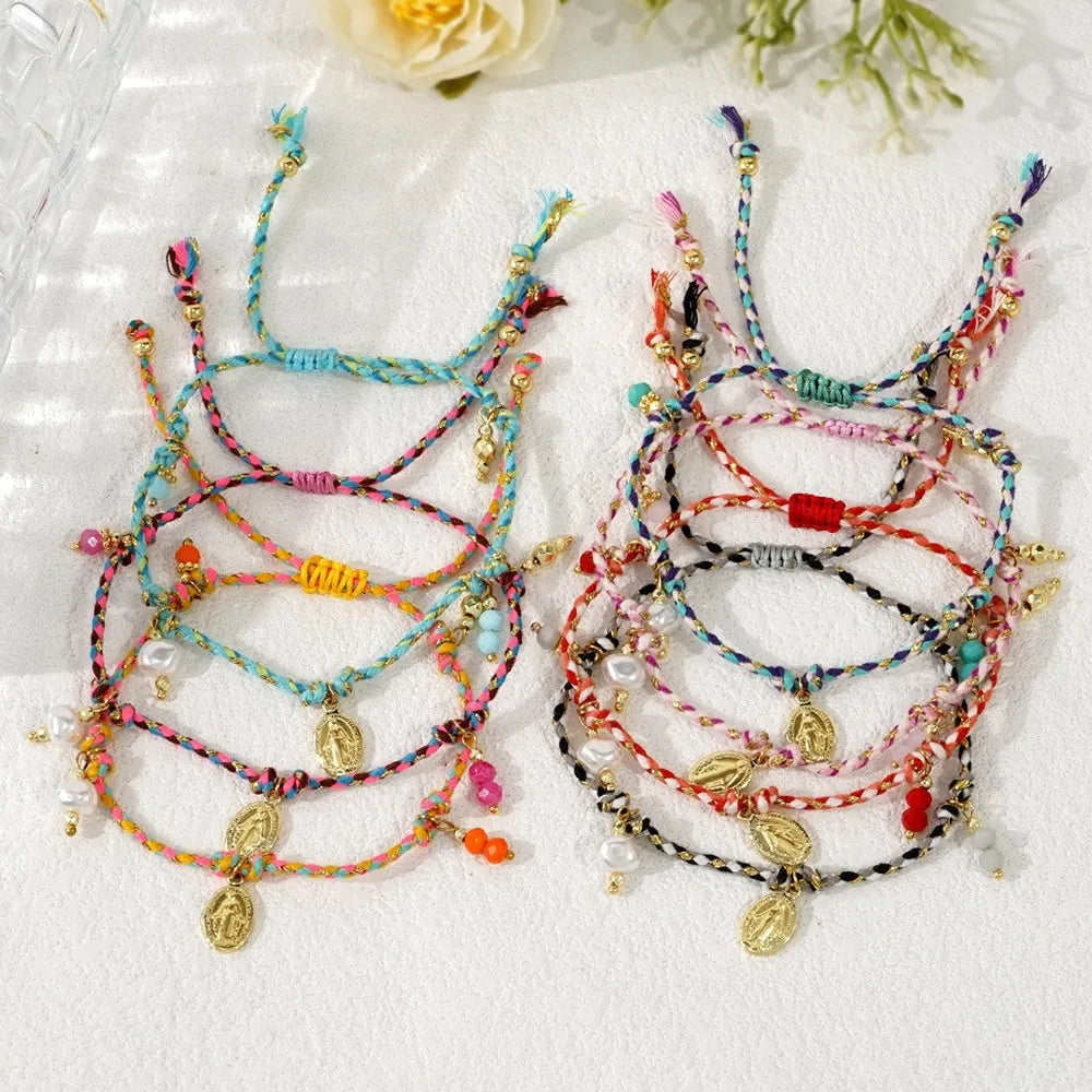 Close-up of a colourful hand-woven braided rope bracelet styled as an ethnic accessory for women.