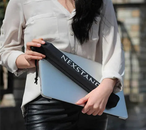 Black folding portable laptop stand made of reinforced nylon, shown in open and closed positions.