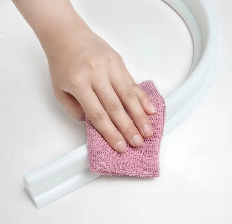 Flexible silicone bathroom water blocking strip in black, gray, and white colour options for shower room dry-wet separation