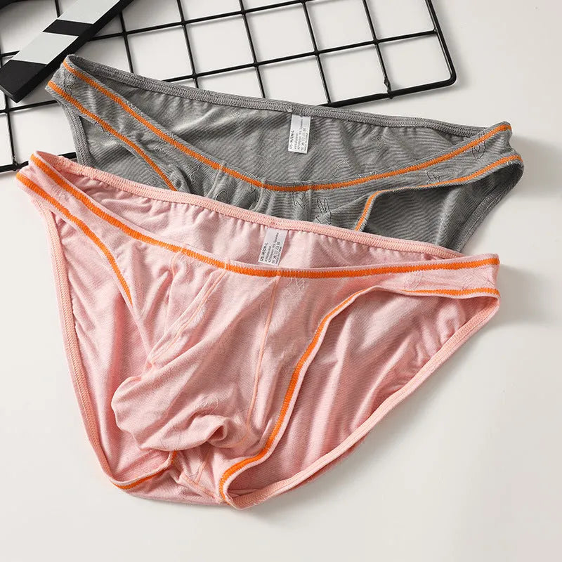 Men's dark grey modal underwear with butt-lift design on a white background