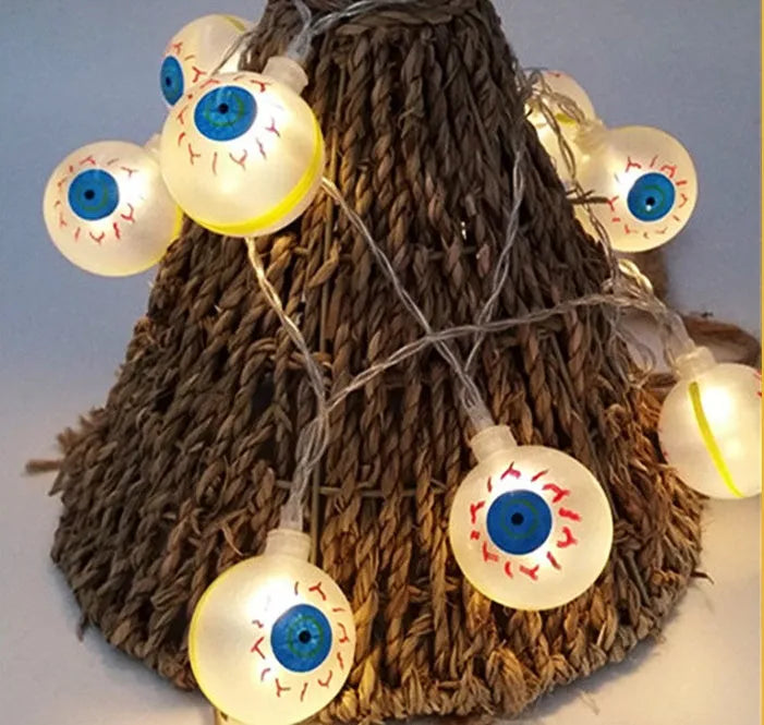 Halloween LED string lights with pumpkin, ghost and bat pendants on white cord
