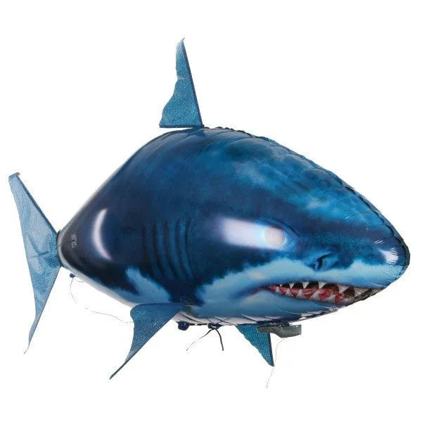 Large remote control shark inflatable balloon toy floating indoors with remote.