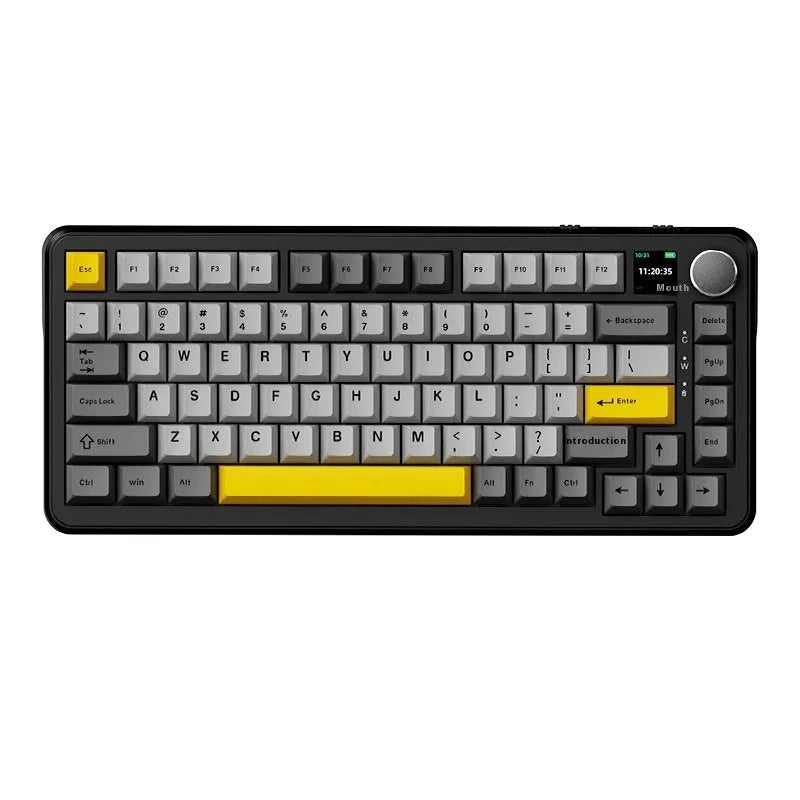 Black, grey and yellow wireless mechanical keyboard with hot-swap switches and included tools on a desk.