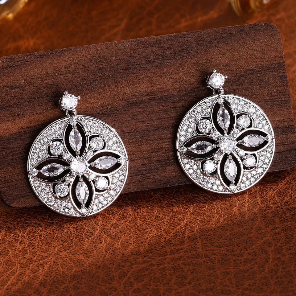 Hollow design zircon disc earrings for women copper electroplated white finish pair