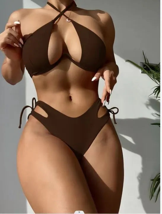 Women's brown halter bikini top and briefs on a neutral background.