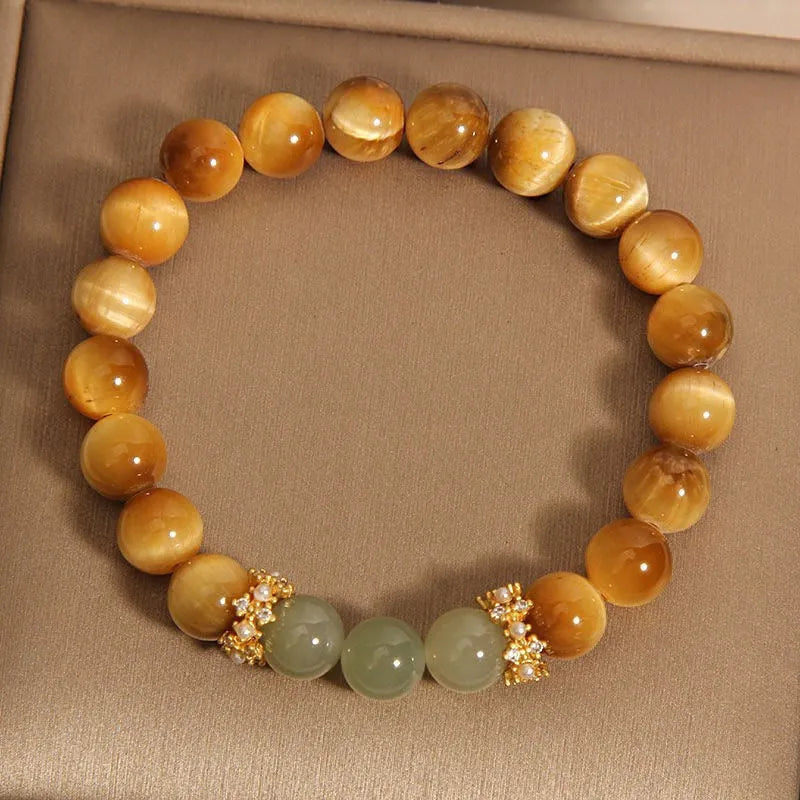 Natural yellow Tiger's Eye Hetian Jade bracelet with symbolic Chinese patterns in U-shaped design