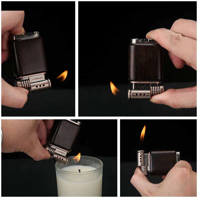 Black wood finished ebony gas lighter with rosewood decorative patterns including sun face and good luck symbols