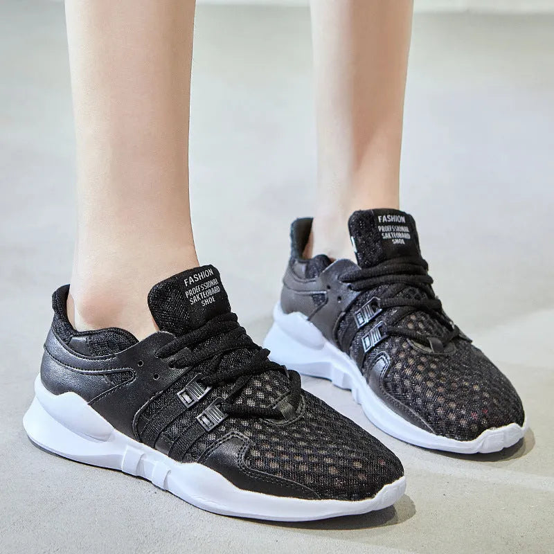 Casual mesh sneakers with hollow-out breathable design and round toe in black and white colour options