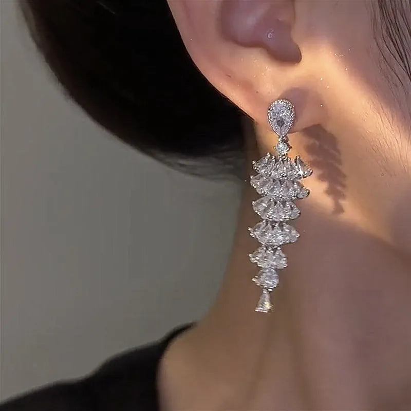 Zircon Christmas tree drop earrings with silver pagoda colour finish on copper construction