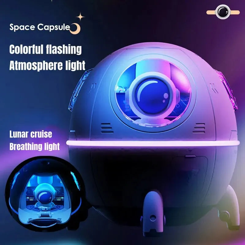 Astronaut-shaped portable USB humidifier with colourful LED light on a desk