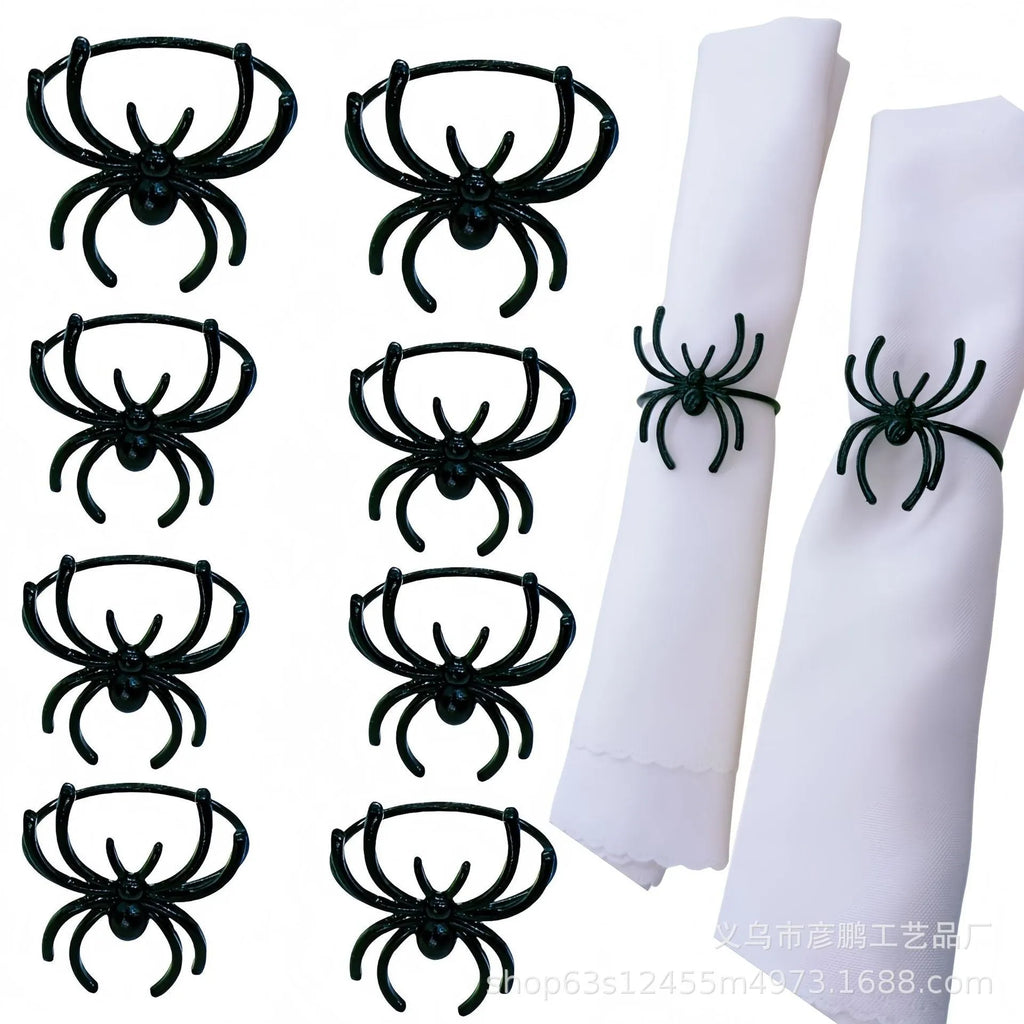Six black spider-shaped alloy napkin rings for Halloween table decoration.