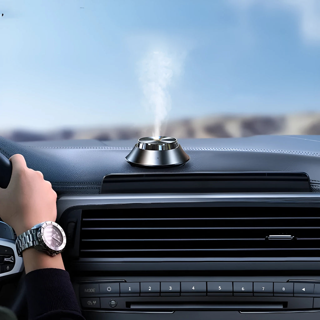 Black metal USB car aromatherapy diffuser with butterfly design and 50ml essential oil bottle
