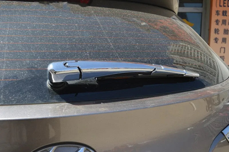 Set of four silvery ABS plastic rear window wiper cover trims for a Hyundai car
