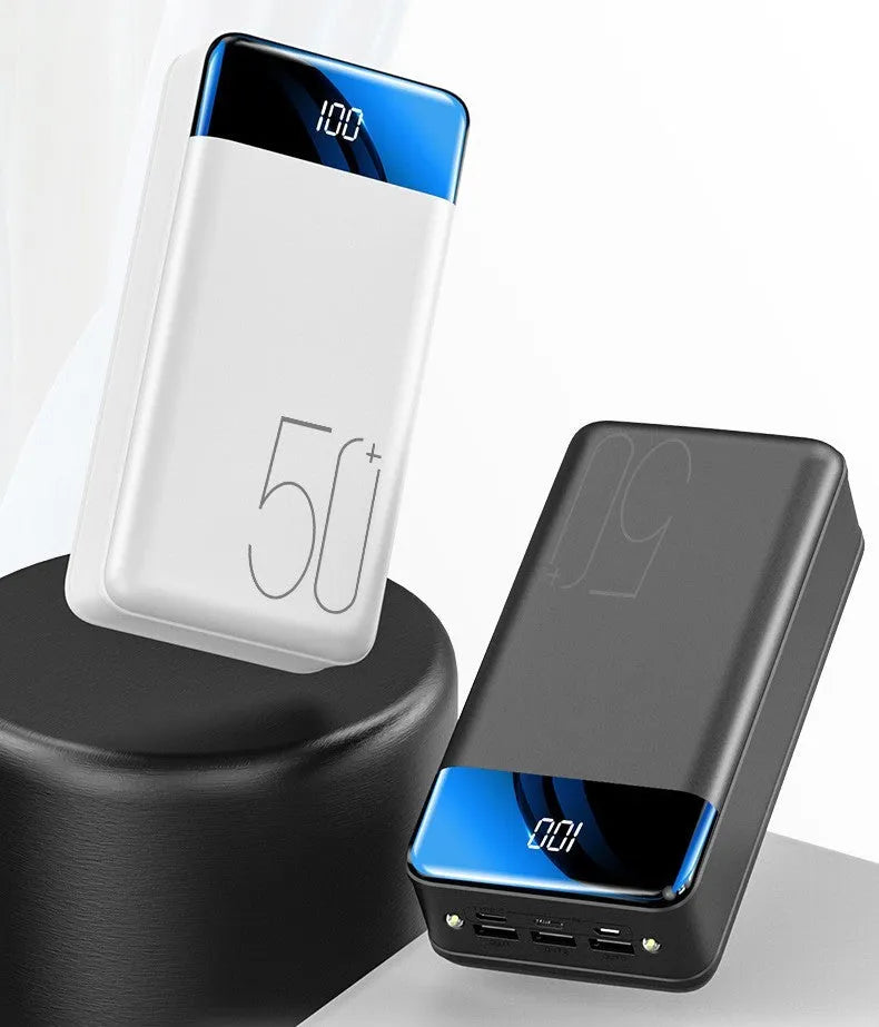 Large 50000mAh capacity power bank with three output ports in black plastic casing