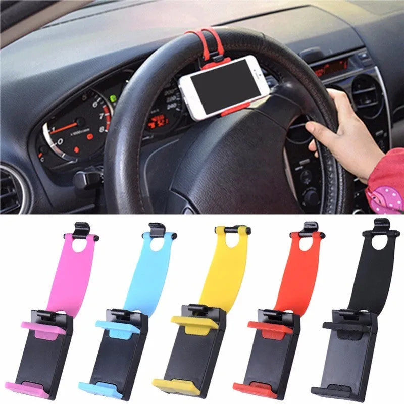 Black steering wheel phone holder clip mounted on car steering wheel holding smartphone