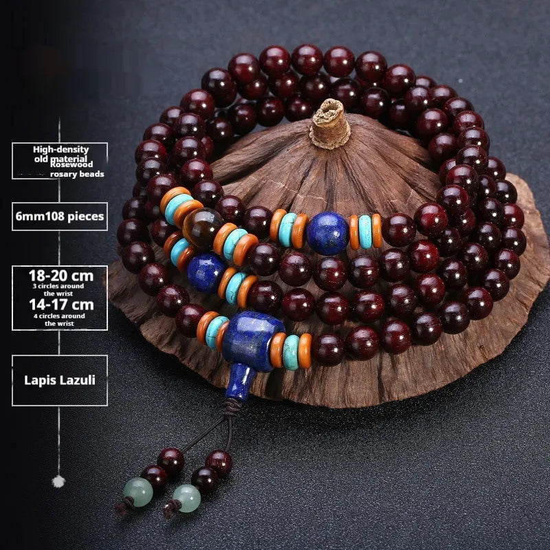 Men's rosewood prayer bracelet with 108 beads in a lapis lazuli style.