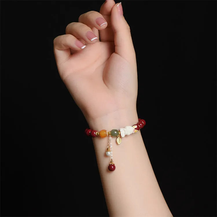 Natural beeswax purple gold sand cinnabar rabbit bracelet for women in Chinese national style.