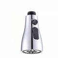 Silver universal kitchen faucet sprayer with rotating head shown on a sink tap.