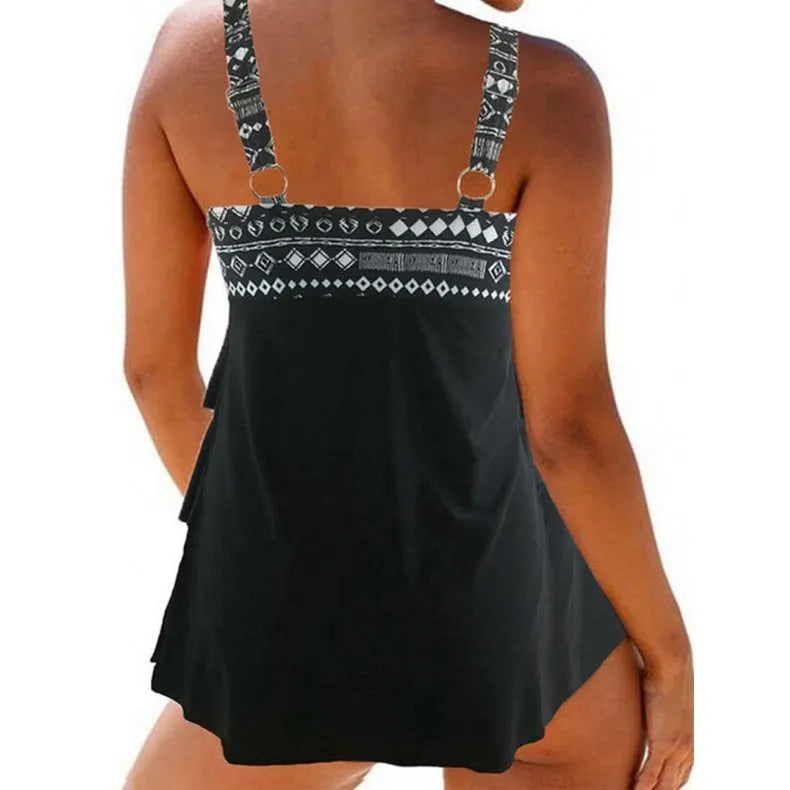 Women's plus-size swimsuit with double shoulder straps, bow detail, and split bottom in picture colour