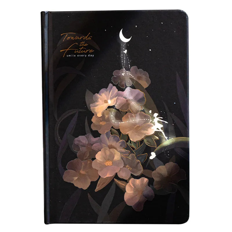 A5 size notebook with a luminous cover, open to show colour illustration pages and lined 160gsm paper.