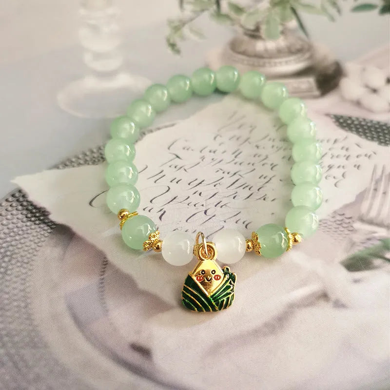 Chinese style glass bamboo leaf bracelet for women with manual craft details.