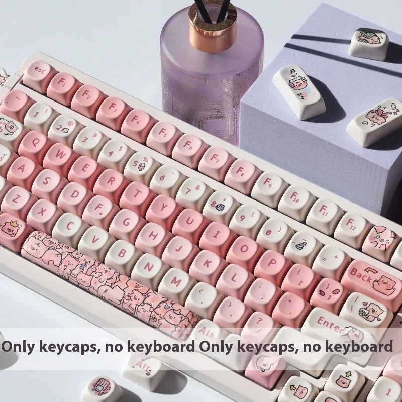 Close-up of a pink pig character artisan key cap for mechanical keyboards with five-sided sublimation printing.