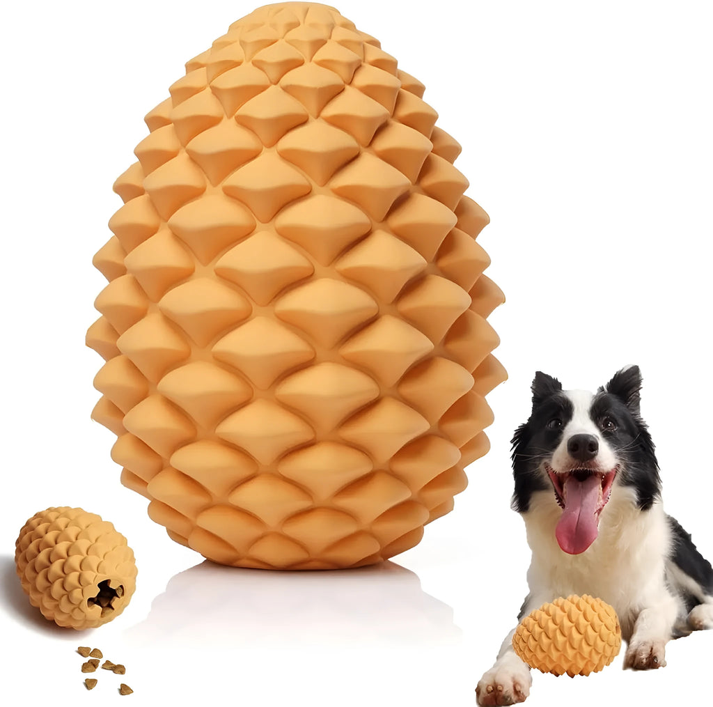 Yellow pine cone shaped natural rubber dog toy with textured surfaces and treat dispenser