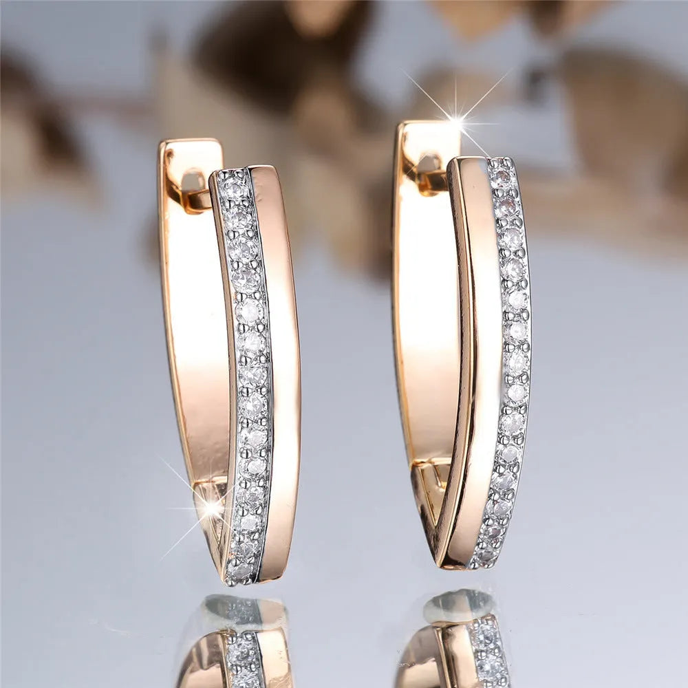 Geometric V-shaped women's ear clips with champagne gold electroplated finish on copper