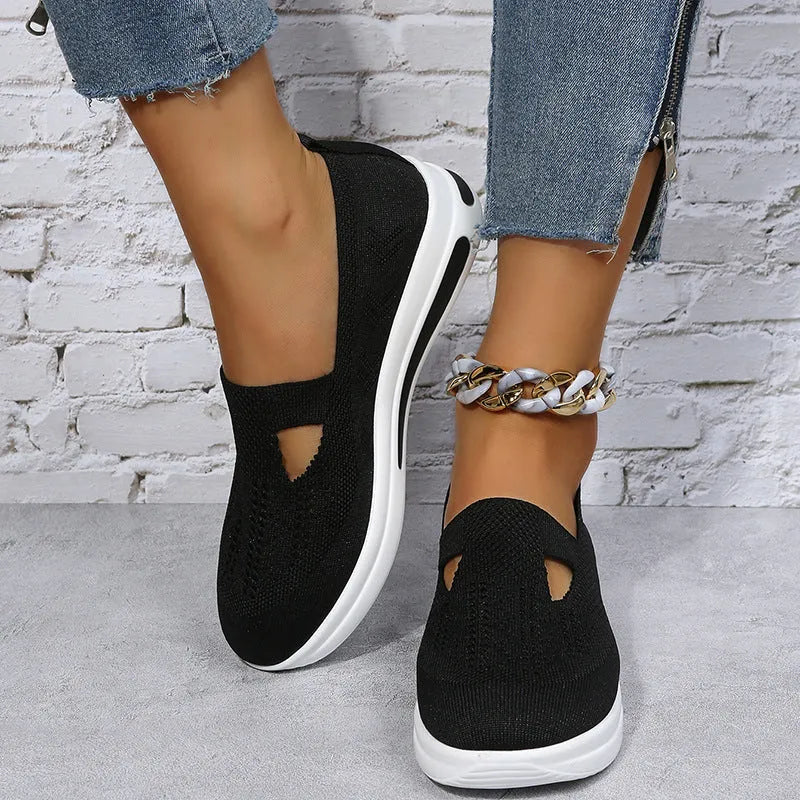 Flat platform wedge casual sneakers with mesh upper, round toe, and rubber sole in black, blue, and pink colours