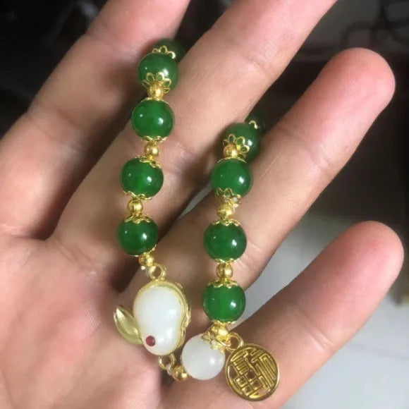 Chinese style glass bamboo leaf bracelet for women with manual craft details.
