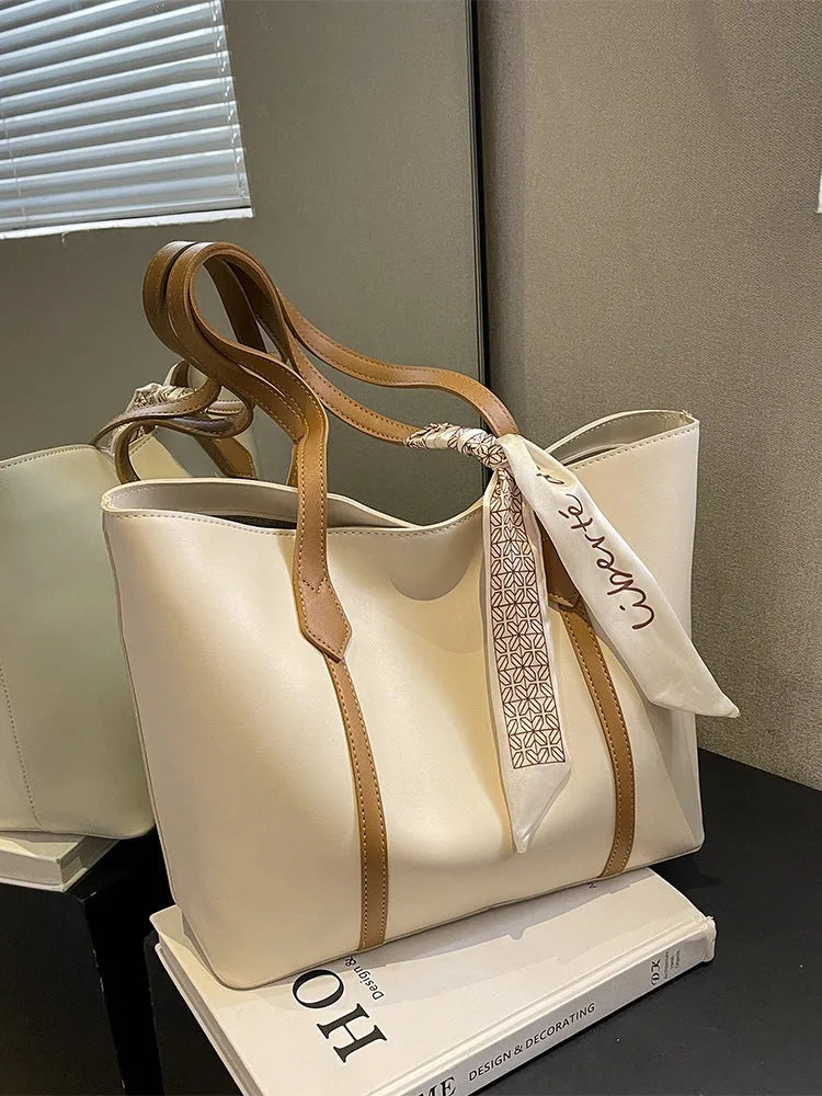 Women's large capacity casual tote shoulder bag in soft bucket design with crossbody strap