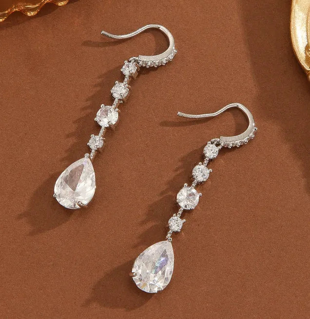 Silver white zircon teardrop drop earrings for women with electroplated copper finish and pear-shaped silhouette