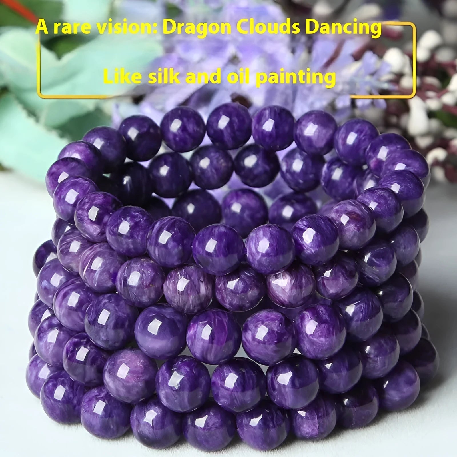 Natural purple charoite crystal bracelet with platinum-coloured metal setting, showing different bead size options.