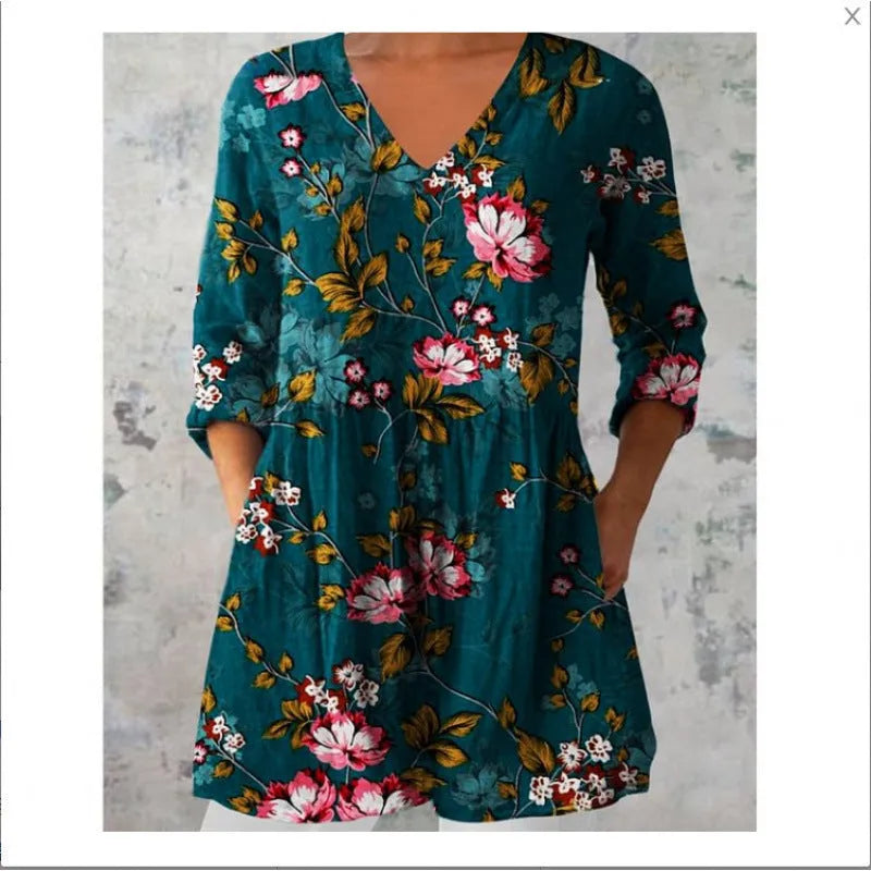 Women's printed loose dress with 3/4 sleeves and wide waist in colourful pattern