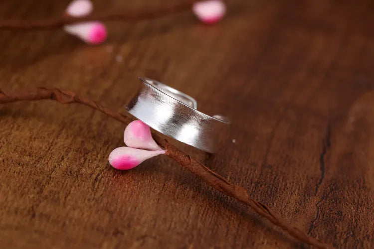 Geometric adjustable opening sterling silver ring with frosted finish and electroplated silver colour