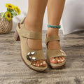 Women's light brown Velcro Roman sandals with round toe and rubber sole on a white background.