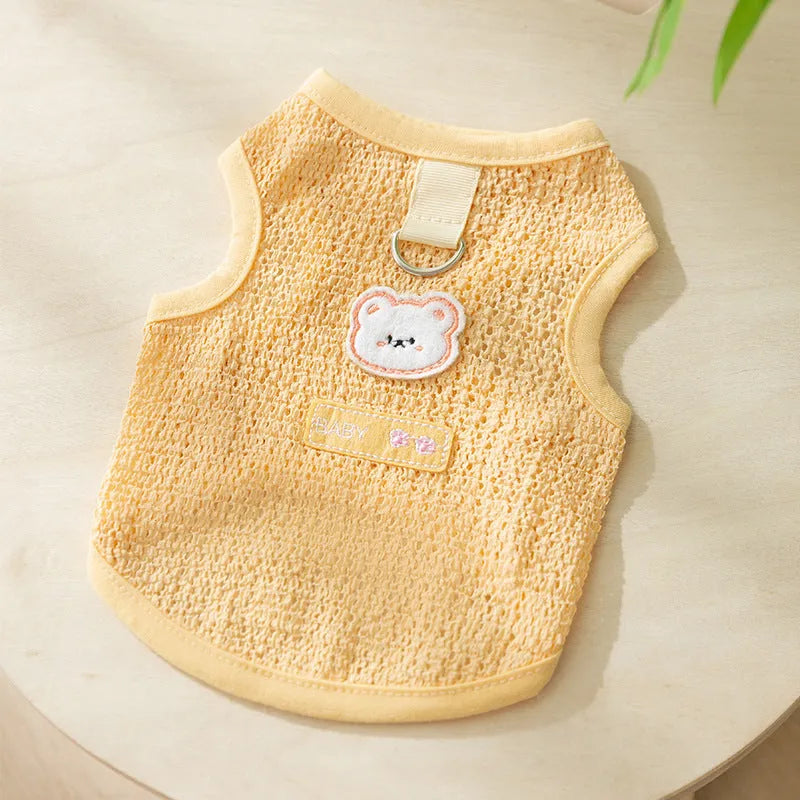 Colourful hollowed-out knitted cat clothing with a cartoon bear patch on the back