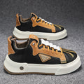 Men's beige low-top casual sneakers with elastic band and leather stitching.