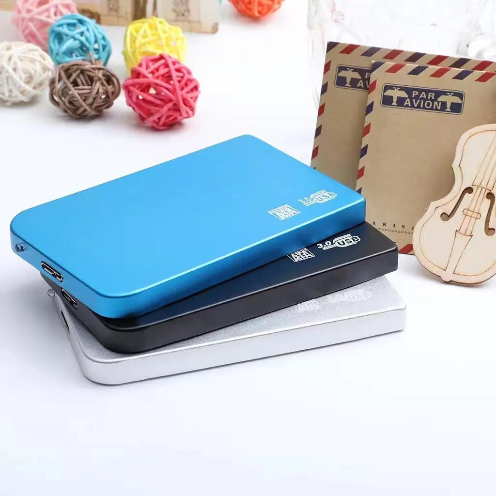 USB 3.0 solid state mobile hard drive in metal shell, showing black, blue, red, and silver colour options.