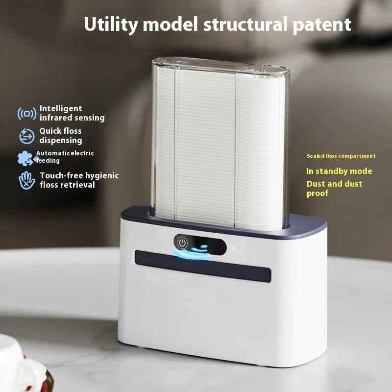 Automatic induction dental floss box in dark grey, gold, or light grey plastic with USB-C charging port.