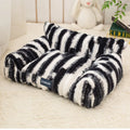 Large plush pet sofa bed for cats in brown colour with pattern drawing design and raised sides