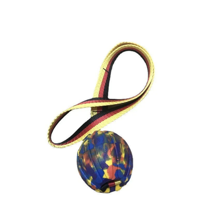 Floating EVA dog training ball with attached string in camouflage or yellow colour options