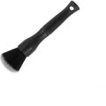 Black ultra-soft pig hair car detailing brush with PP plastic handle on a car seat.