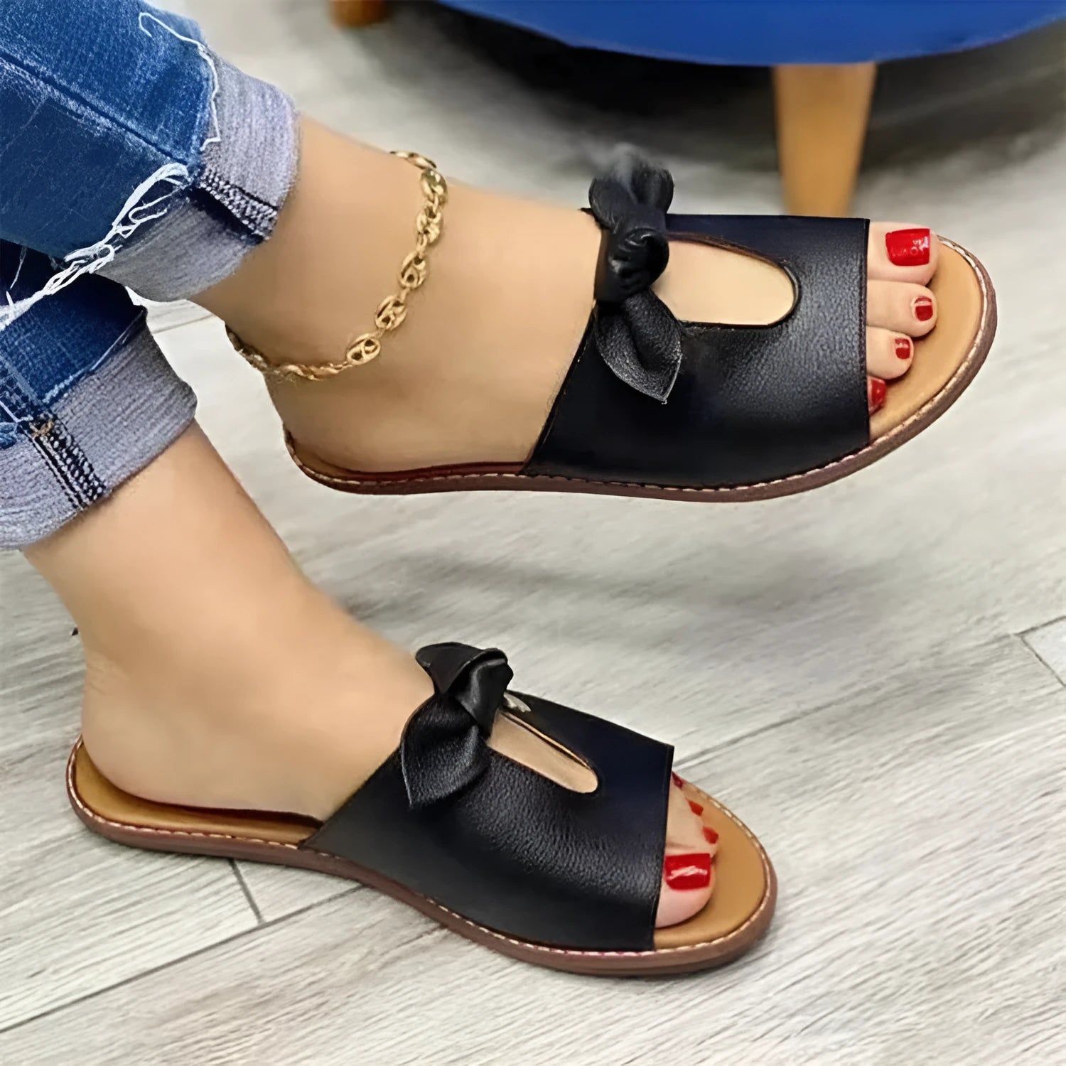 Ladies sandals with bow detailing and fish mouth slipper style in black, gold and pink colours