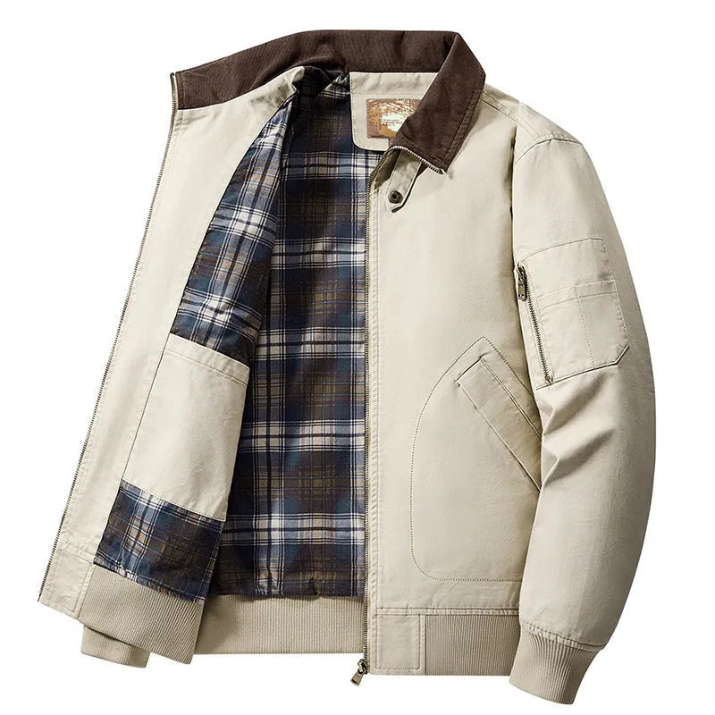 Men's camel coloured washed cotton baseball-style flight jacket on a hanger