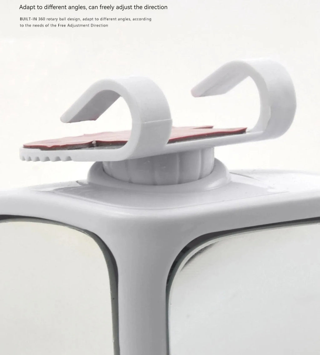 Small round wide-angle car reversing mirror with adjustable joint and adhesive backing.