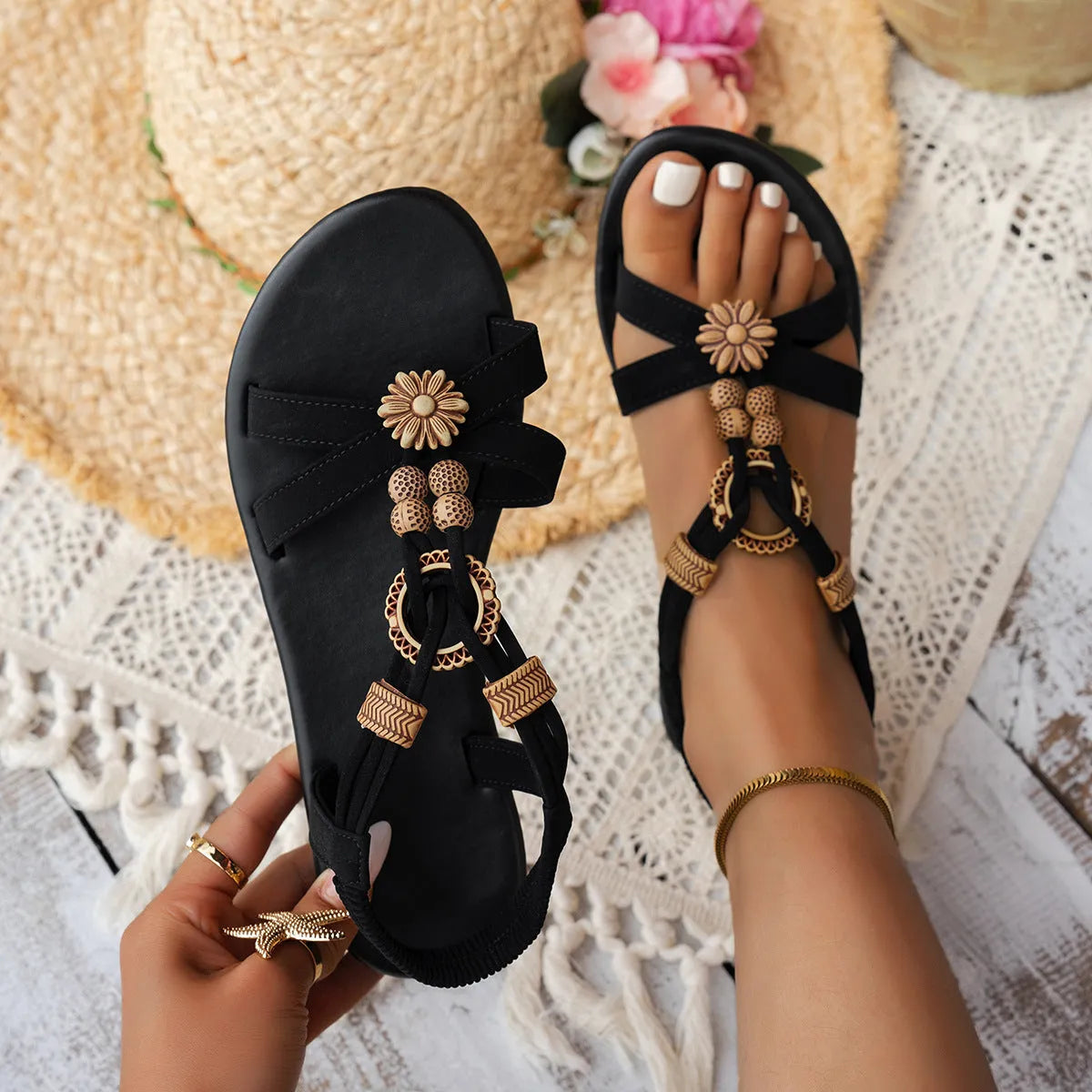 Black women's ethnic style flat beach sandals with beaded weave design and elastic band